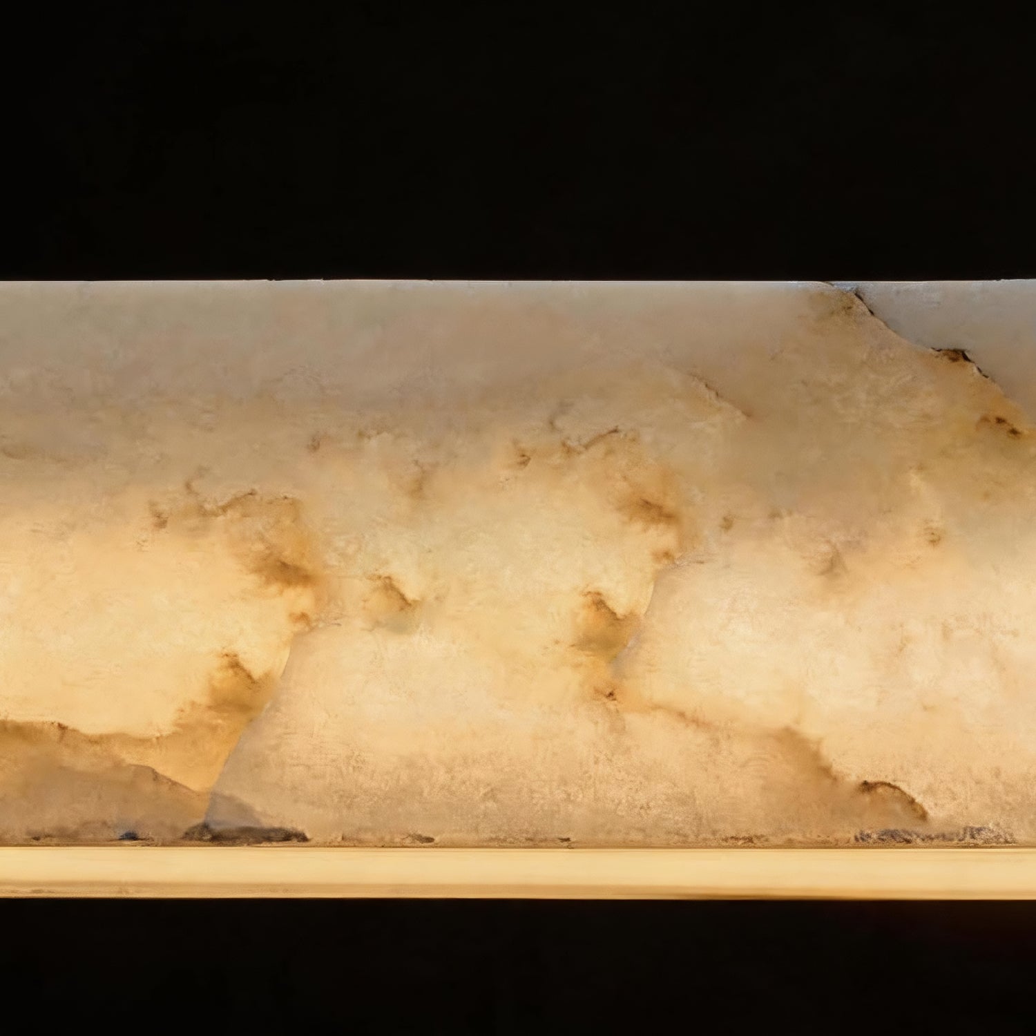 Extreme close-up of the Horizon Modern Minimalist Alabaster Ultra-Slim Linear LED Chandelier — highlighting the smooth, polished alabaster surface with intricate natural veining and soft ambient illumination -carra-home