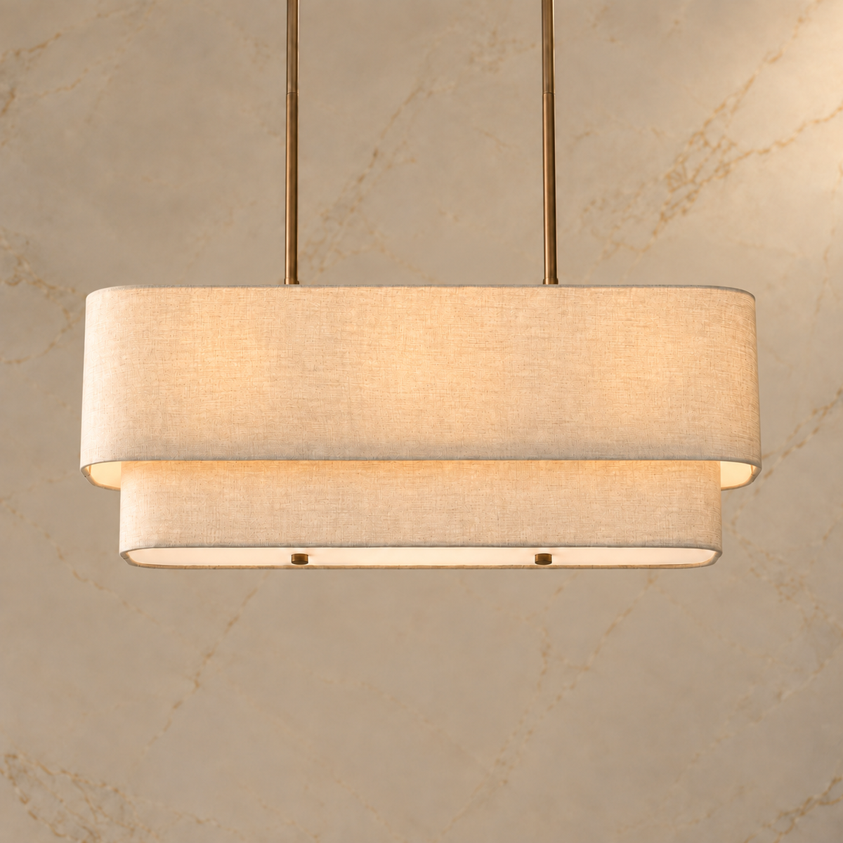 Natural linen and bronze Laren layered linear chandelier, light on | CARRA HOME
