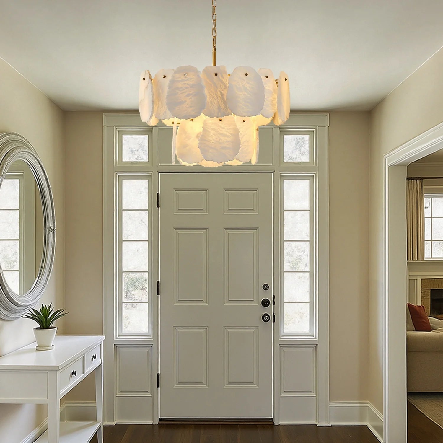 layered-alabaster-round-chandelier-installed-in-foyer-carra-home