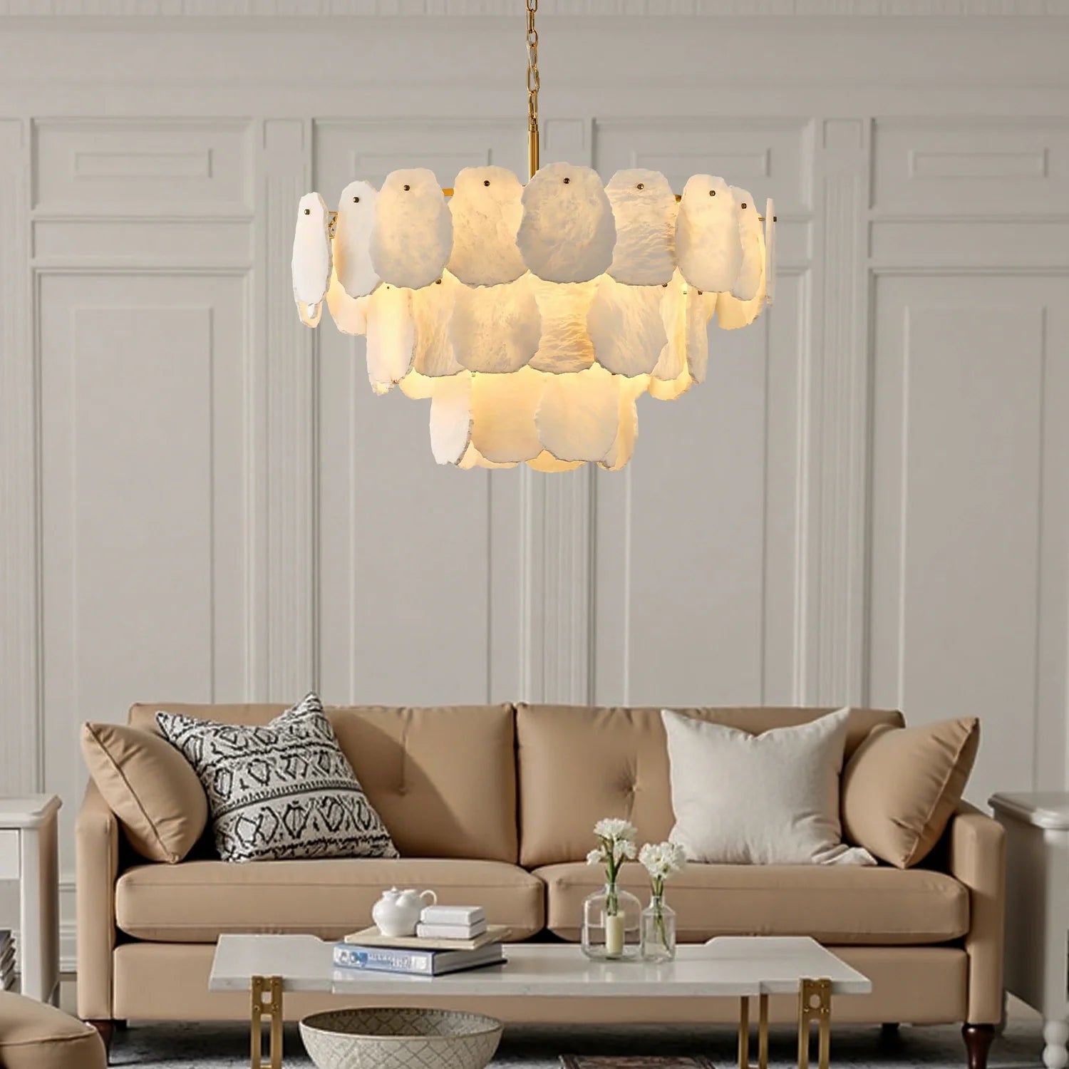 layered-alabaster-round-chandelier-installed-in-the-living-room-carra-home