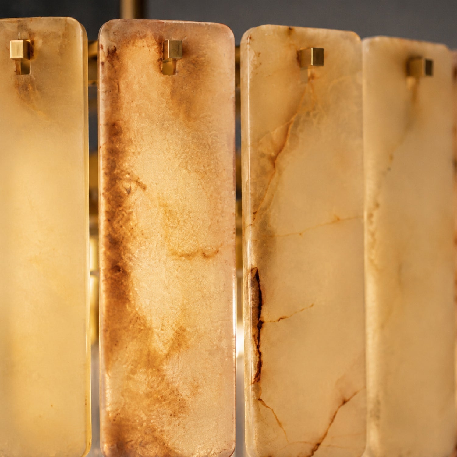 lunareth-modern-luxury-gold-alabaster-drum-chandelier-turn-on-details-carra-home