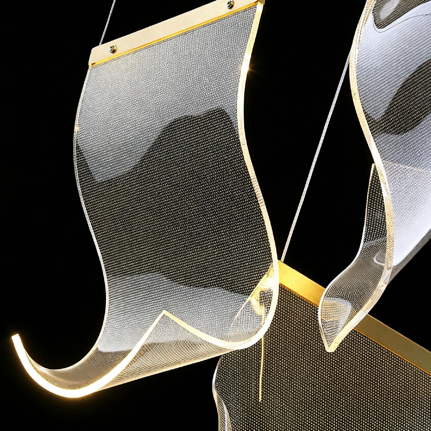 Close-up detail of Lyra Ripple Glass Cascading Sheet Chandelier — showcasing the wavy, textured surface of the individual glass sheets and their reflective qualities when lit | Carra Home