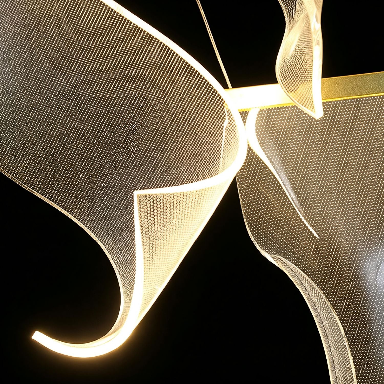 Extreme close-up of Lyra Ripple Glass Cascading Sheet Chandelier — focusing on the gold-toned metal frame, thin suspension wires, and the precise engineering of the cascading glass elements | Carra Home