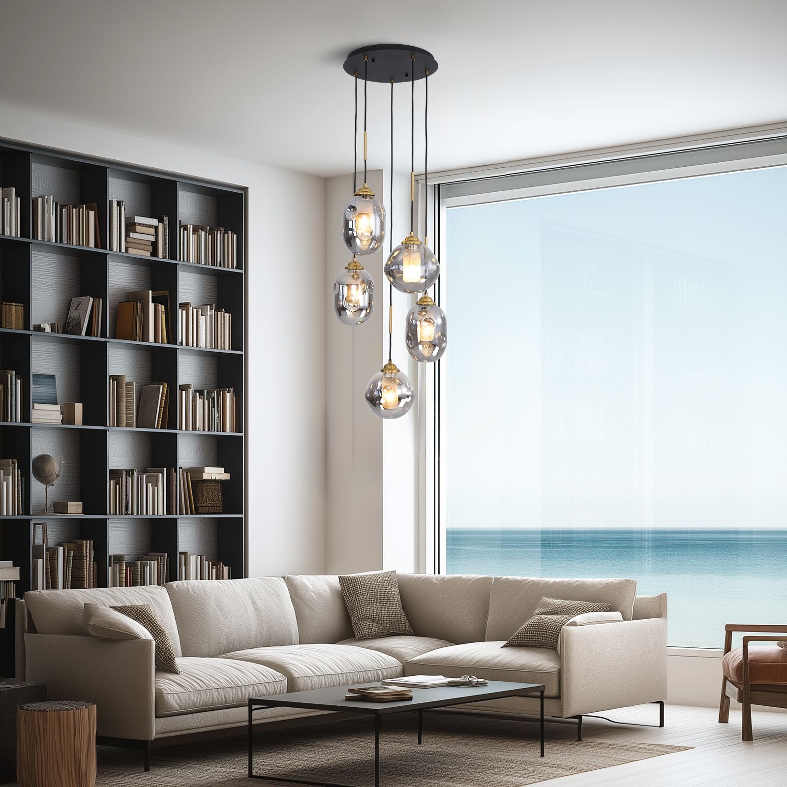 Nova Lava Glass Cascading Chandelier in a bright living room — beige sofa, bookshelf, floor lamp, and large windows, creating a cozy yet elegant ambiance