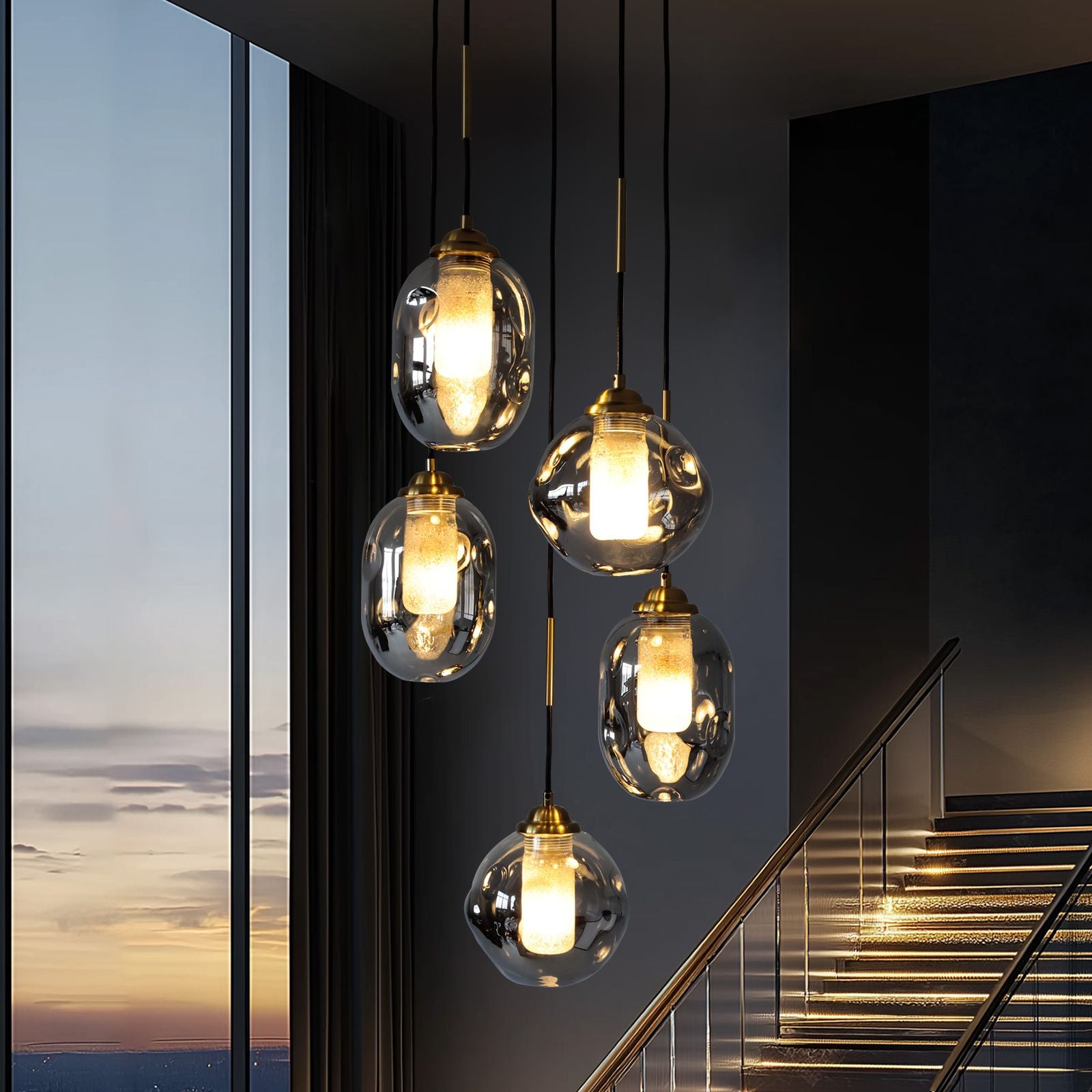 Nova Lava Glass Cascading Chandelier in a sleek staircase — curved glass panels, metallic handrails, and warm lighting, enhancing the contemporary aesthetic