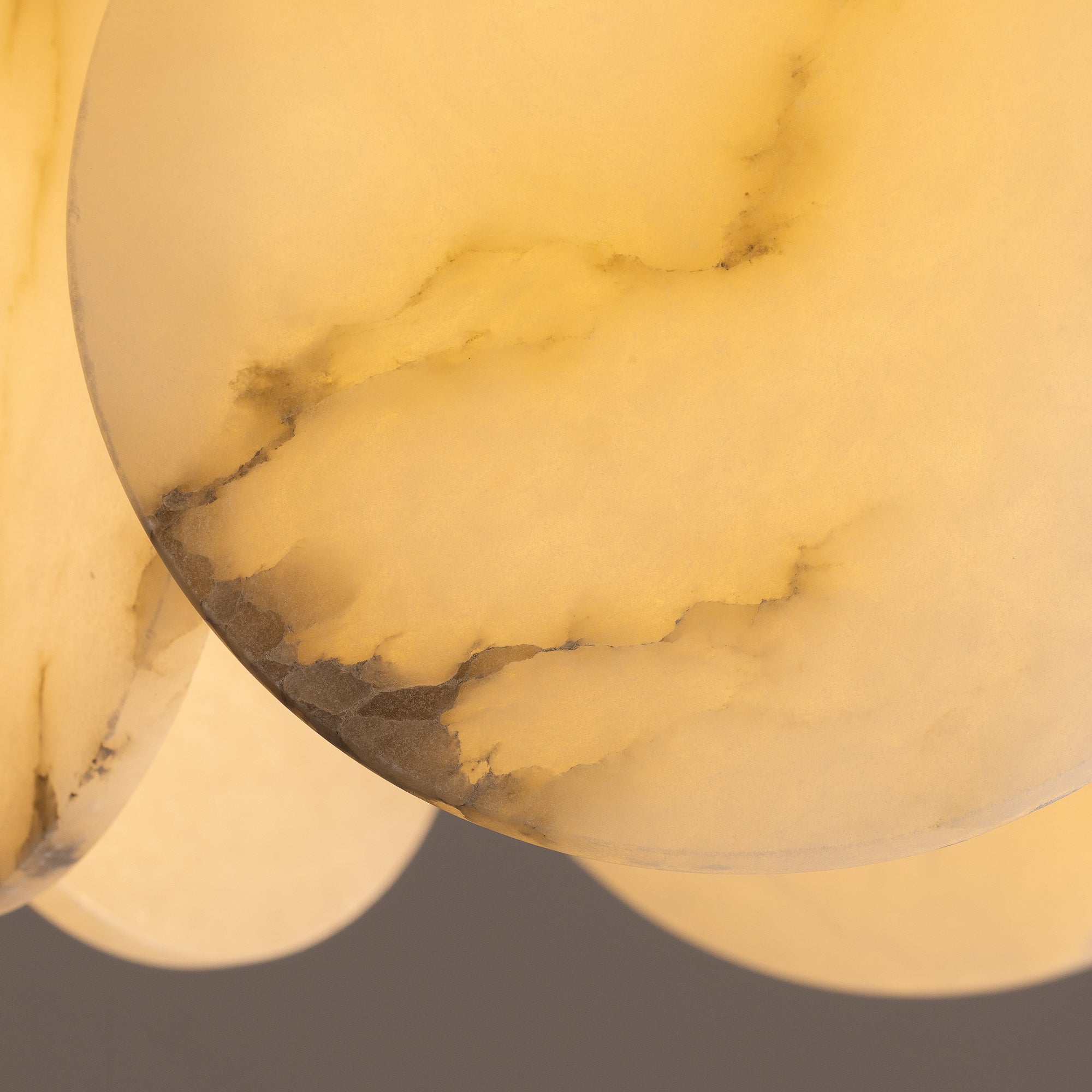 orlisse-modern-luxury-brass-alabaster-double-tier-disc-chandelier-light-on-details-carra-home