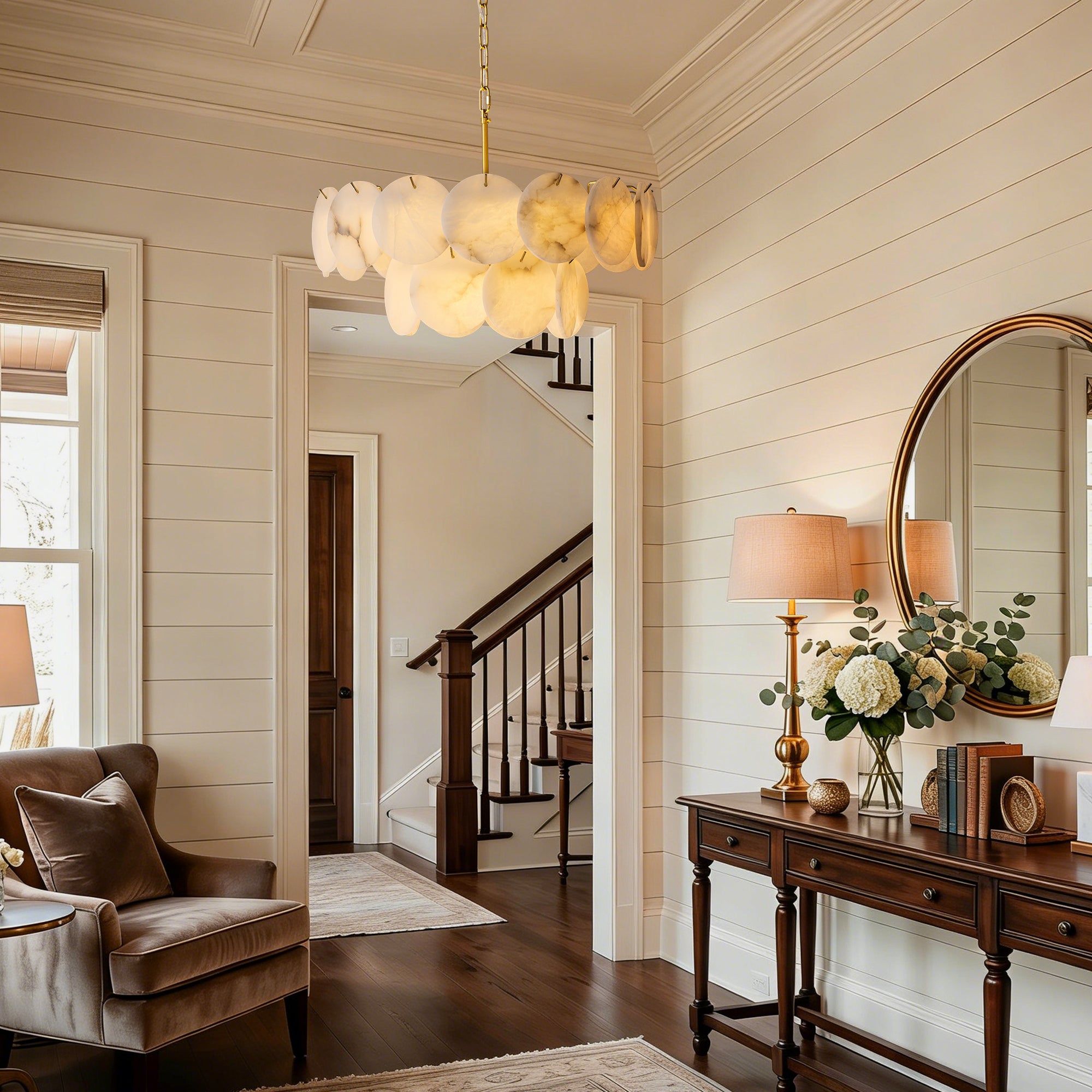 orlisse-modern-luxury-brass-alabaster-double-tier-disc-chandelier-next-to-stair-carra-home