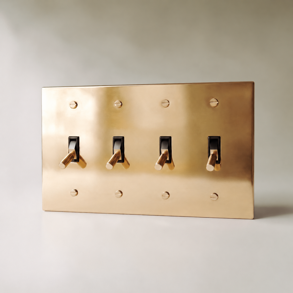 Polished Brass Toggle Switch, 4 Gang product view — seamless faceplate | CARRA HOME