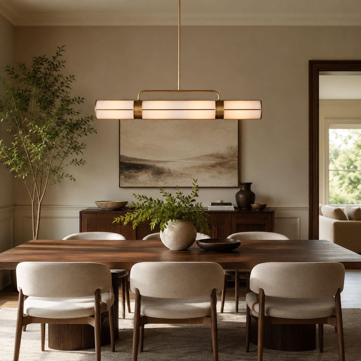 remming-metal-linear-chandelier-over-dining-table-carra-home-1