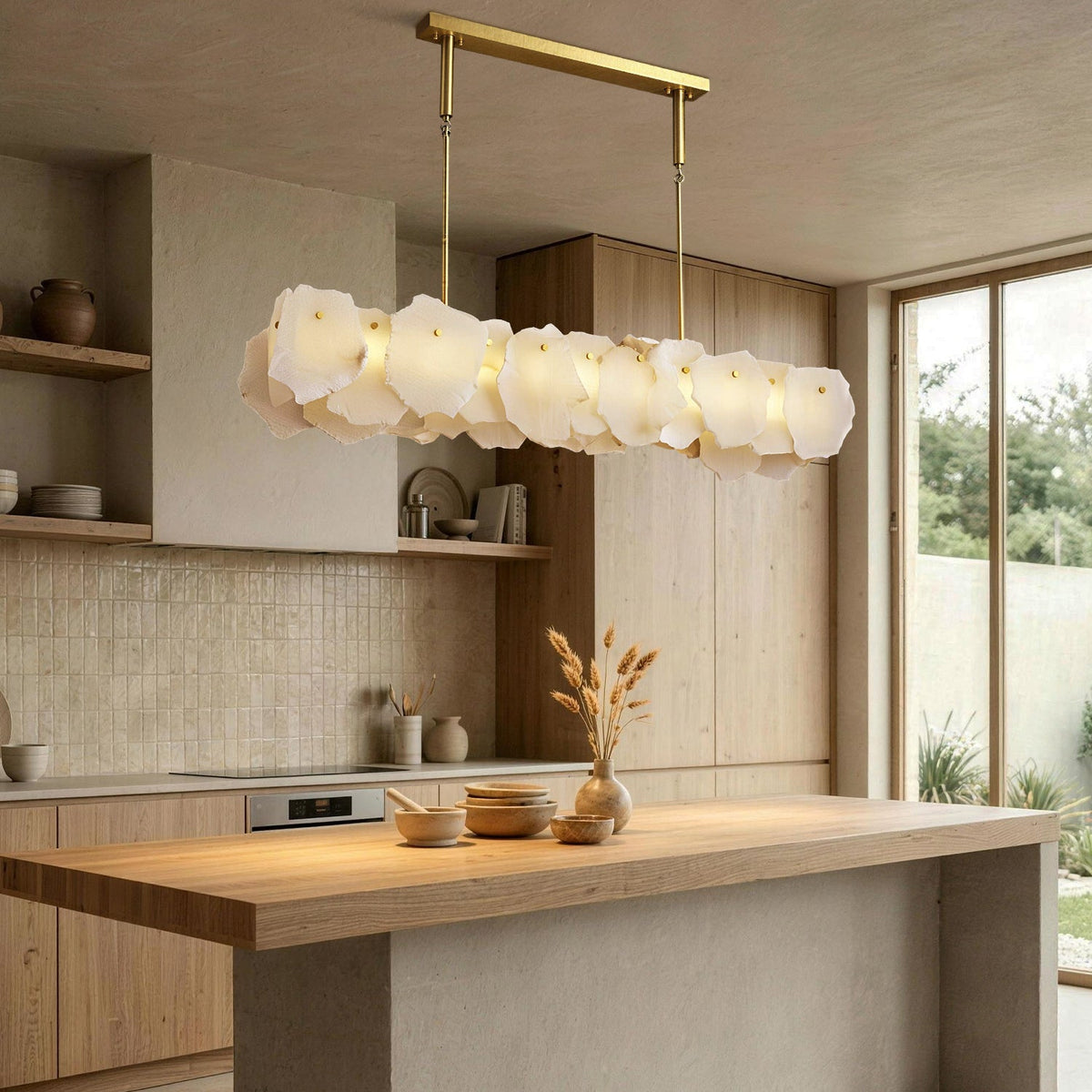 Seravelle Alabaster Petal Linear Chandelier above a kitchen island