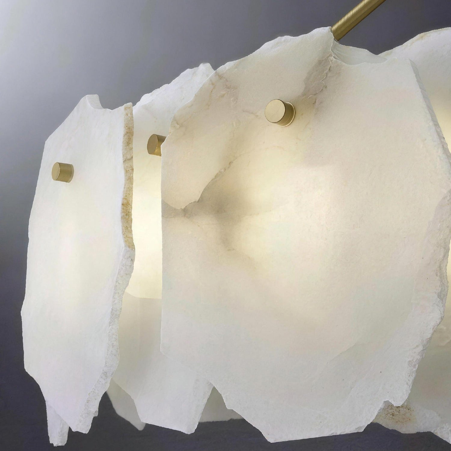 seravelle-modern-organic-gold-alabaster-layered-chandelier-details-turn-on-carra-home