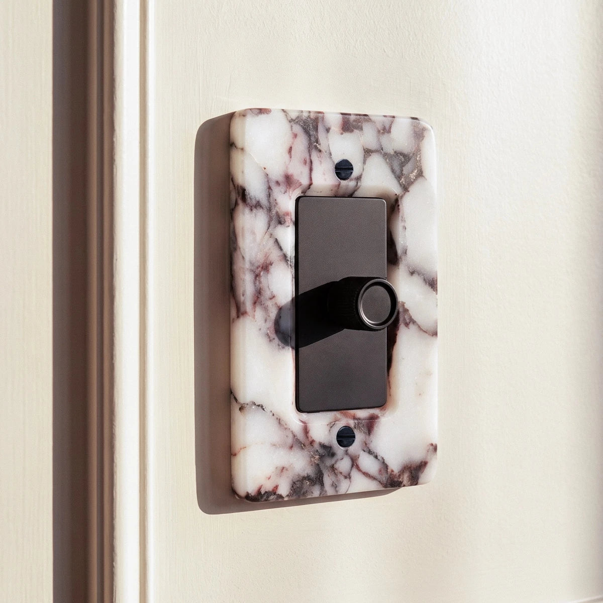 Stone Rotary Dimmer Switch installed in an interior, view 19 | CARRA HOME