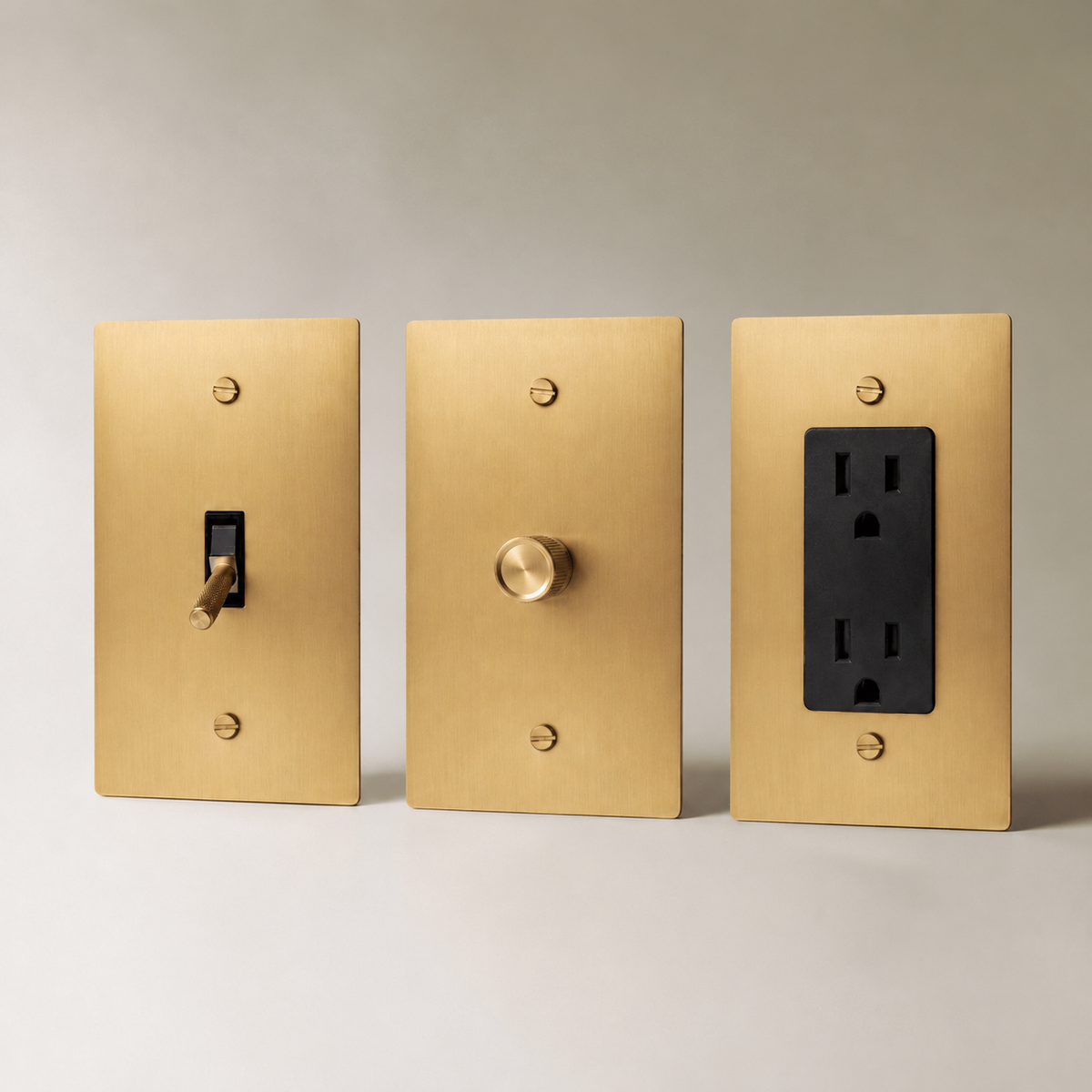 Brass Electrical Sample Kit — Brass 3-Piece dimmer toggle and outlet sample kit — seamless faceplate | CARRA HOME