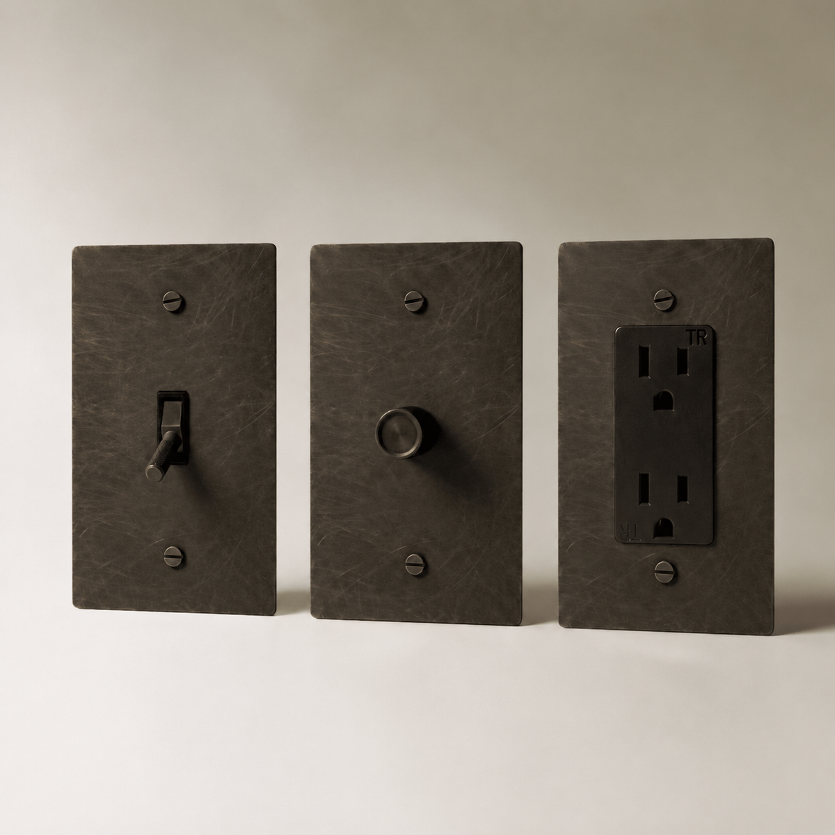 Brass Electrical Sample Kit — Bronze With Patina 3-Piece dimmer toggle and outlet sample kit — seamless faceplate | CARRA HOME
