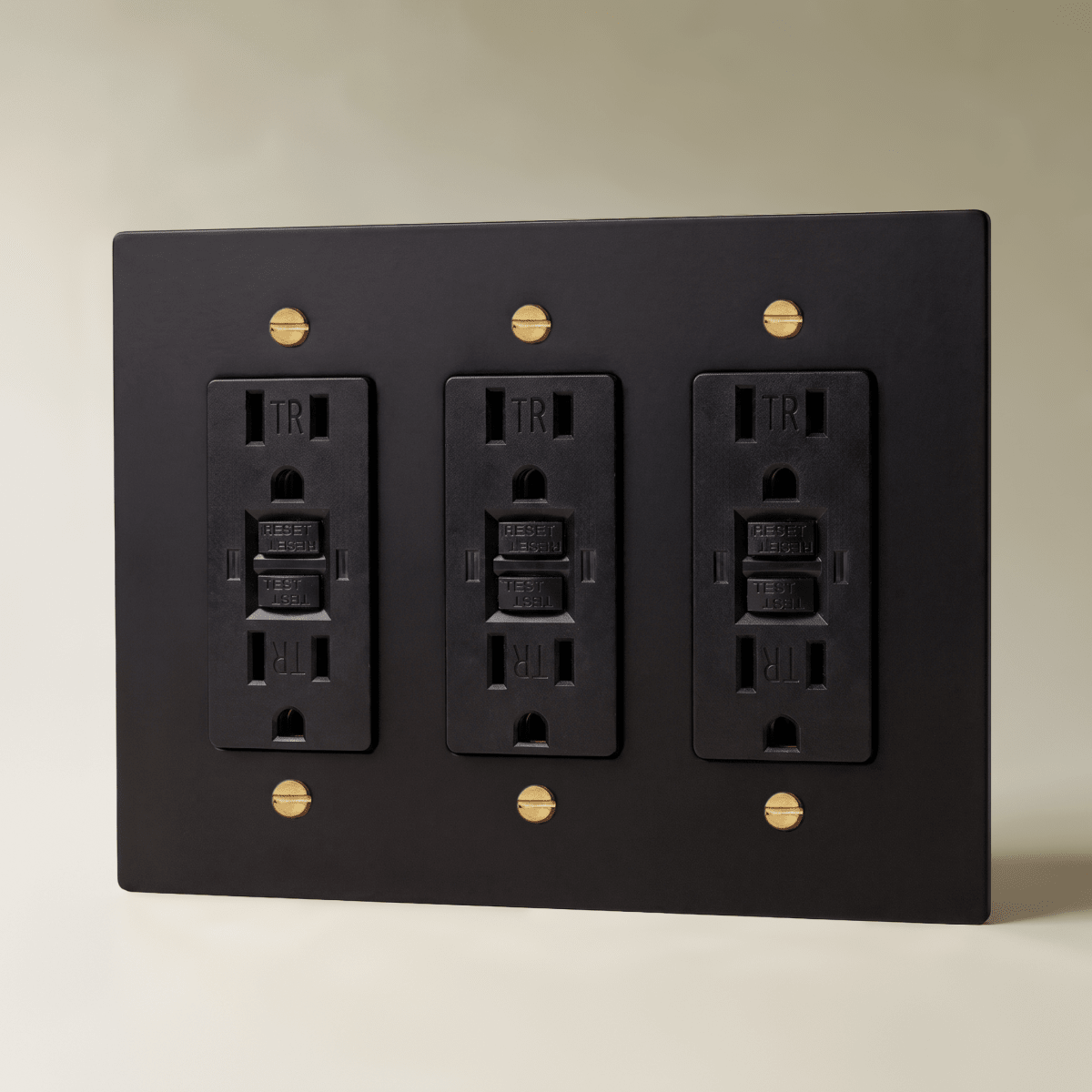 The Brass Outlet (1 to 4 Gang) — Night Black with Brass, 3 Gang, GFCI | CARRA HOME