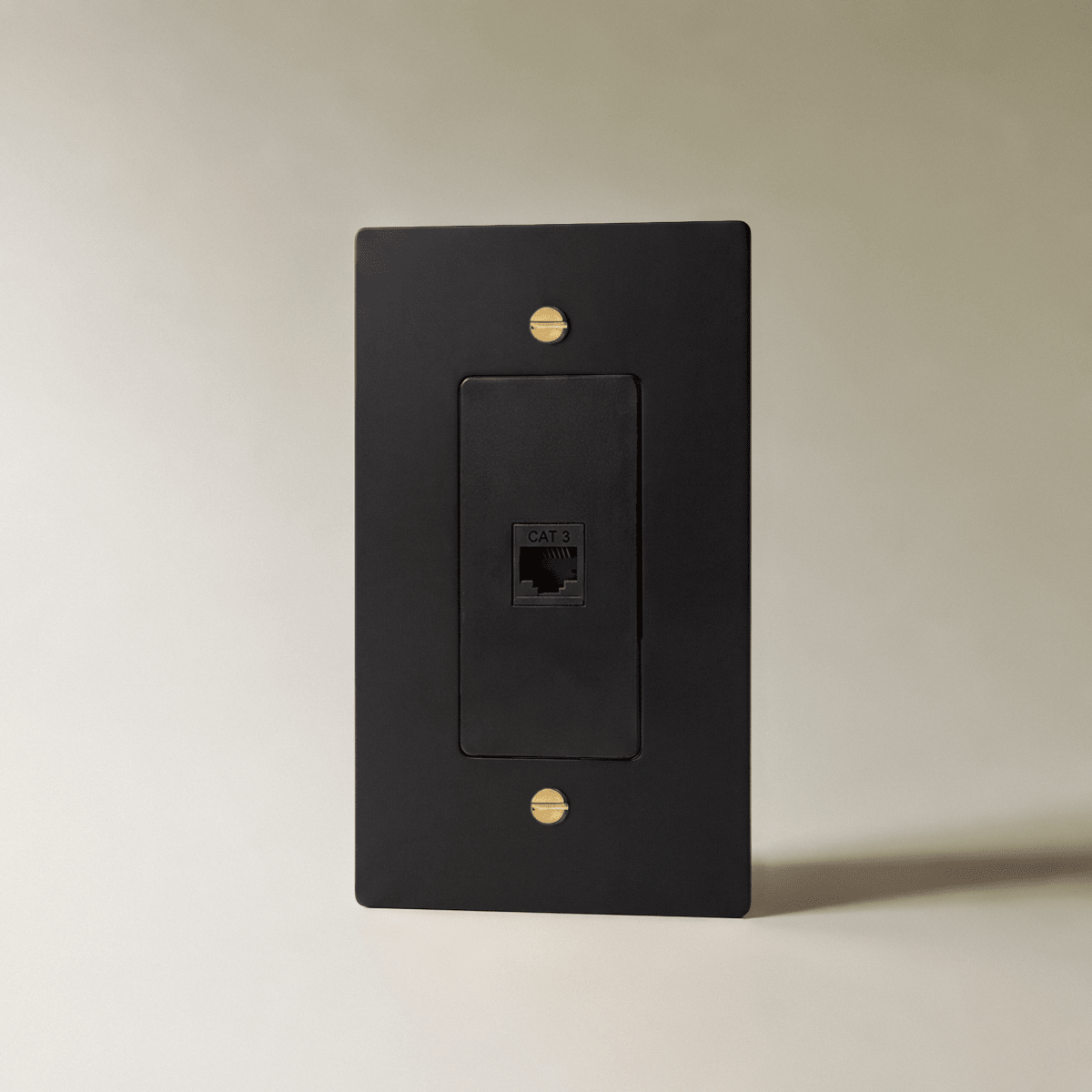 The Brass Telephone Socket (RJ11) (1-Gang) — Night Black with Brass, 1 Gang, Telephone | CARRA HOME