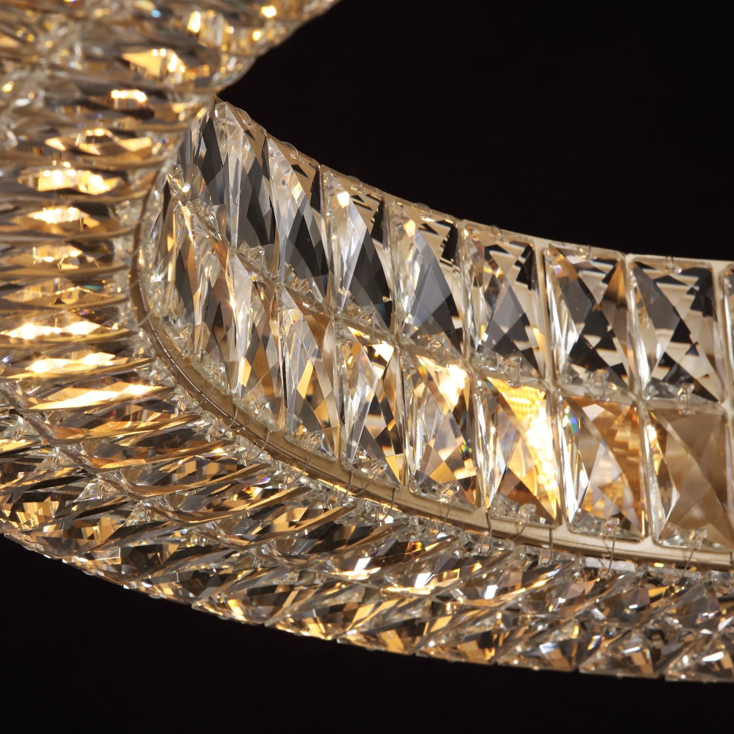Extreme close-up of dual-ring structure — cascading layers, adjustable cables, gold frame | Carra Home