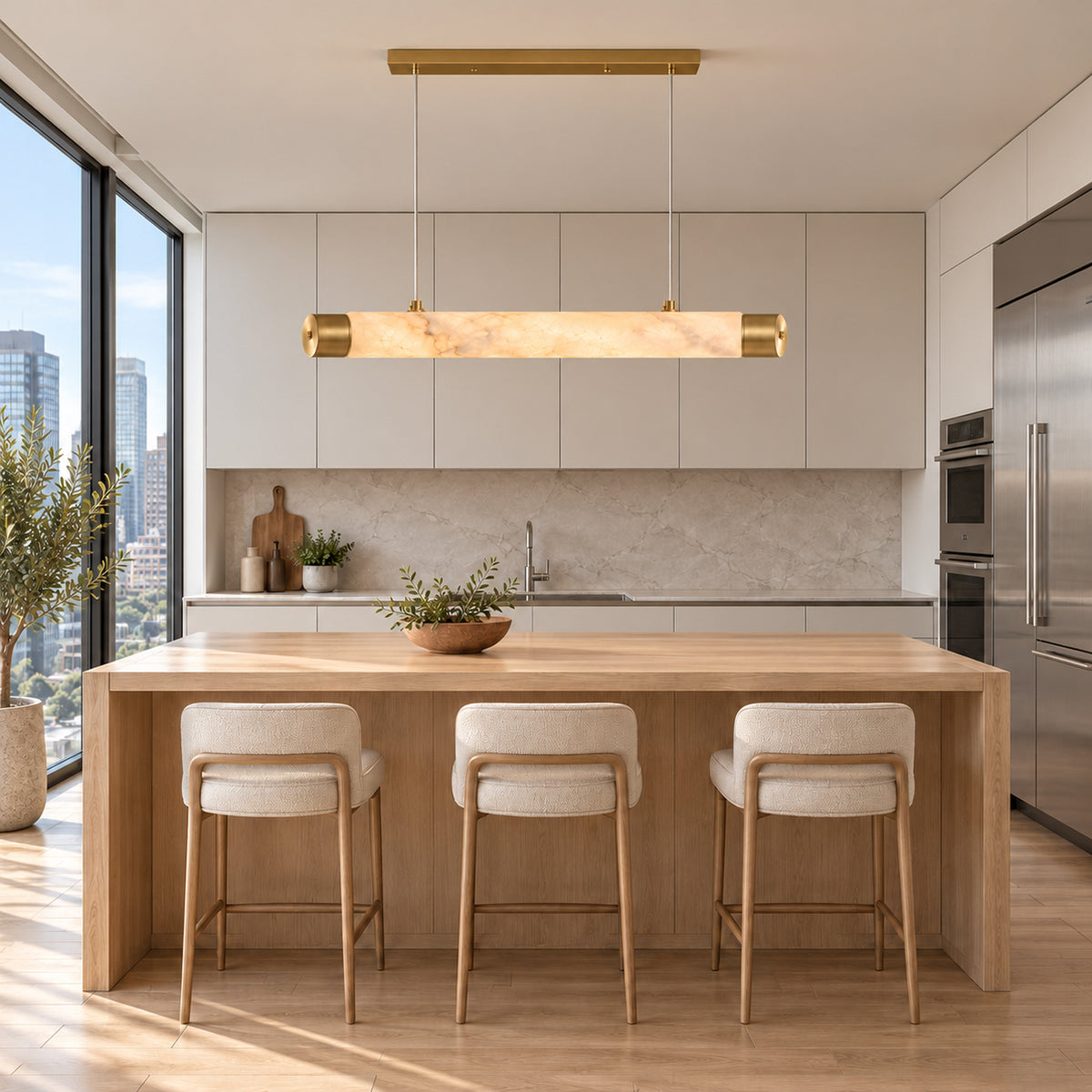 Virel Alabaster Linear Chandelier — Alabaster linear chandelier above a kitchen island with city views | CARRA HOME